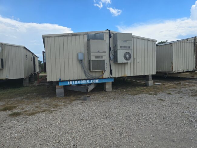 exterior view of modular building that has bard A/C units on end for camps or facilities. Hunting Cabin or other mobile housing or office
